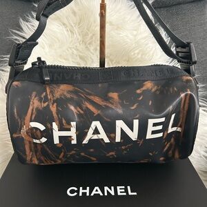 CHANEL Black and Brown Duffel Bag with Striking Design